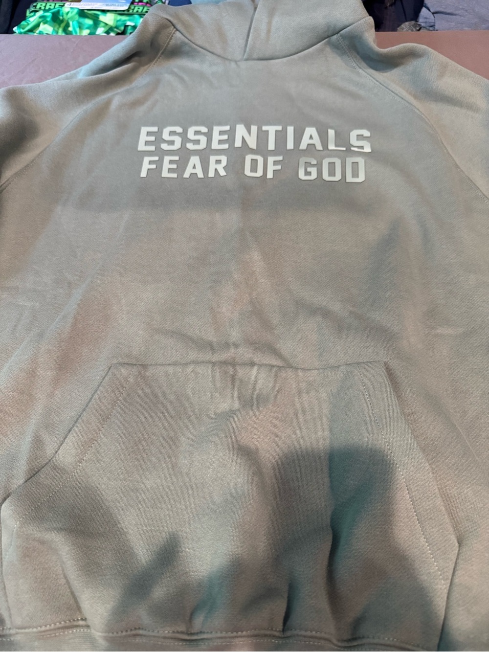 Essentials Fear of God muted Green Hoodie with Fear of God Logo
